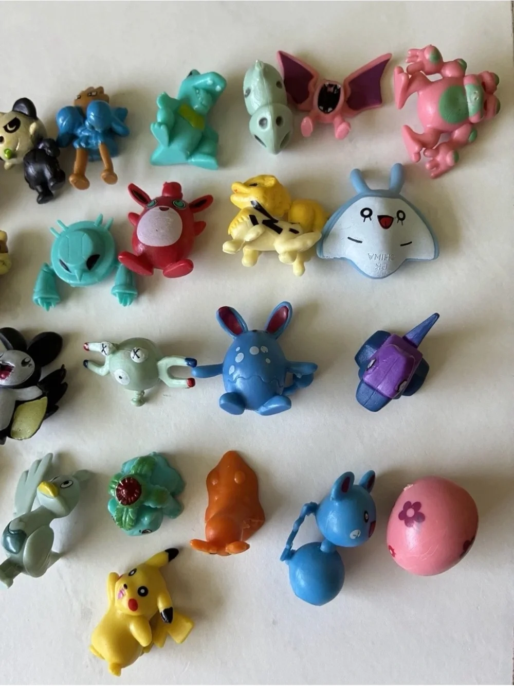 Pokémon Mini Figurine Lot - Assorted Colors (Yellow, Blue, Pink, Green)
